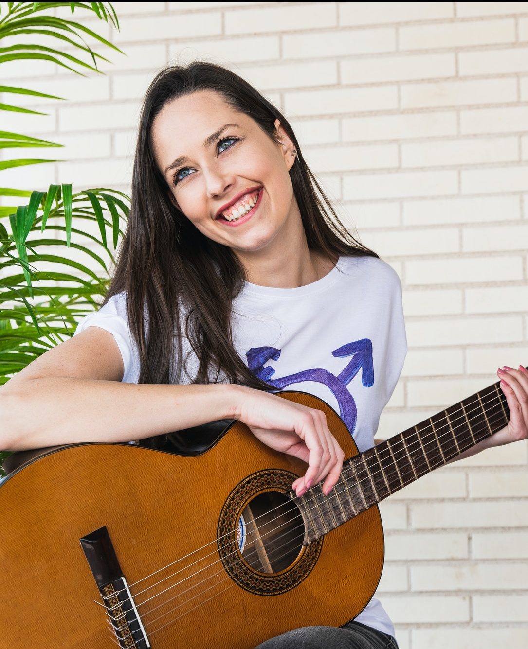Happy musicians with guitars laughing
